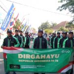 Perkuat Jiwa Nasionalisme, Grab Bangkalan Ikut Lomba Gerak Jalan HUT RI